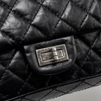 CHANEL SMALL 2.55 REISSUE FLAP BAG AGED CALFSKIN BLACK SHW