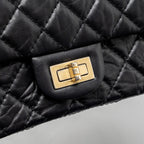 CHANEL SMALL 2.55 REISSUE DOUBLE FLAP BAG AGED CALFSKIN BLACK GHW