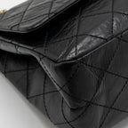 CHANEL MAXI 2.55 REISSUE DOUBLE FLAP BAG AGED CALFSKIN BLACK GHW