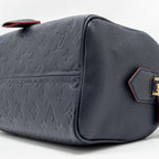 LOUIS VUITTON SPEEDY 25 BANDOULIERE MONOGRAM EMPREINTE NAVY/RED GHW