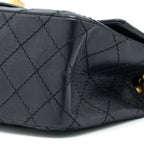 CHANEL MINI 2.55 REISSUE FLAP BAG AGED CALFSKIN BLACK BRUSHED GHW (MICROCHIP)