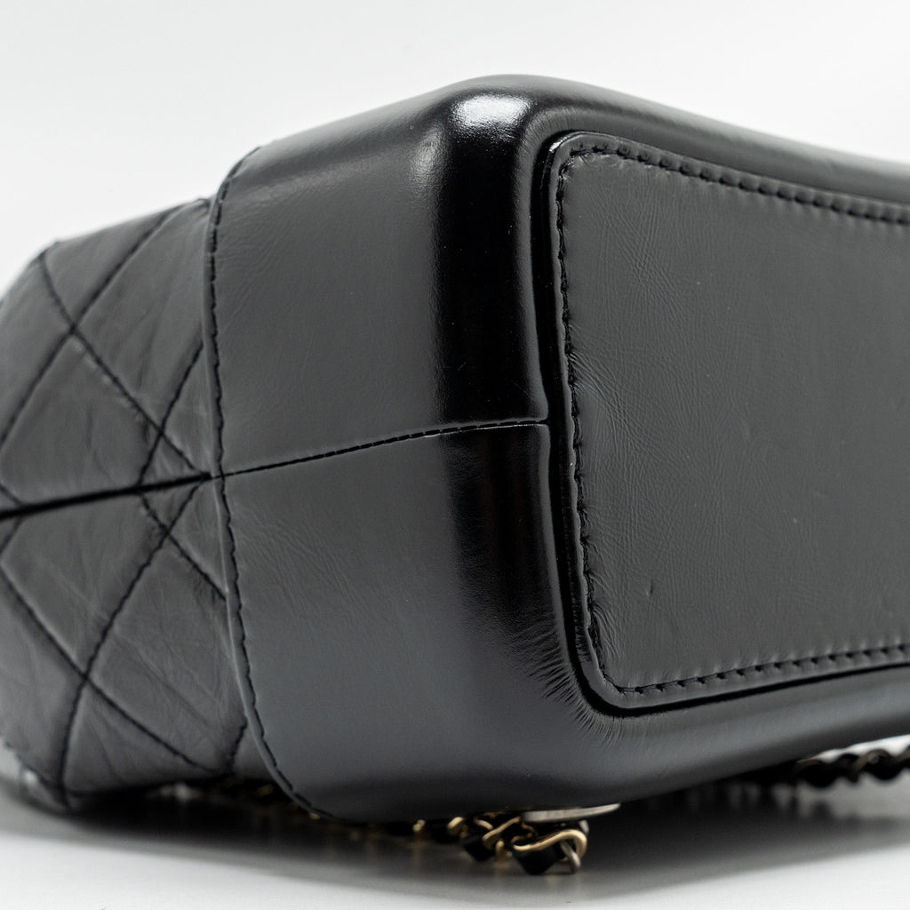 CHANEL SMALL GABRIELLE BACKPACK AGED CALFSKIN BLACK MULTICOLOUR COLOUR HARDWARE (MICROCHIP)