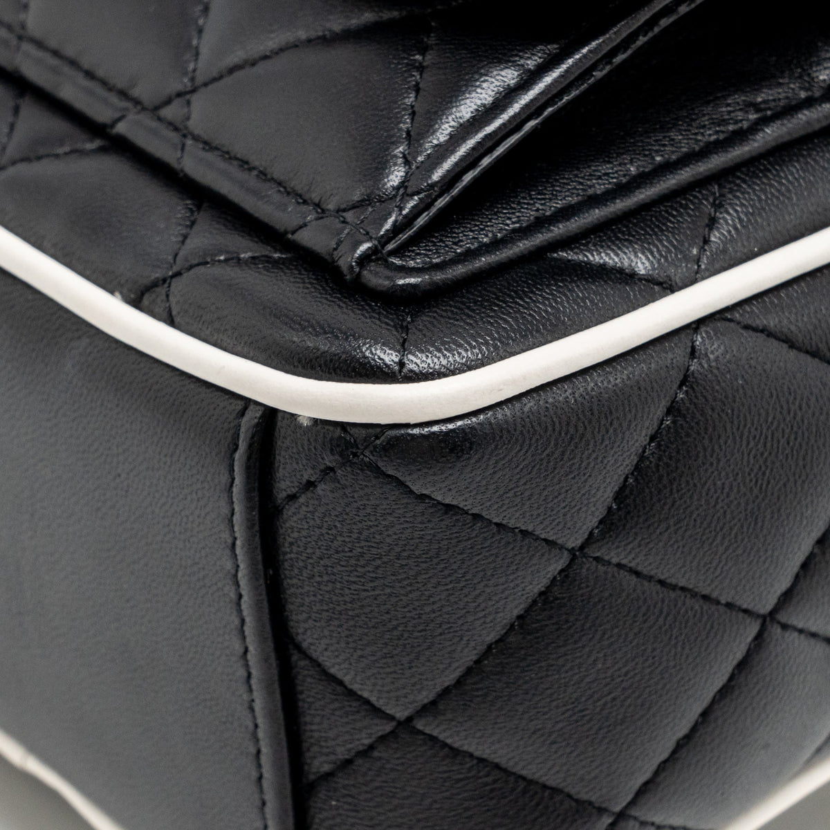 Chanel mini backpack/crossbody bag lambskin black/white LGHW (microchip)