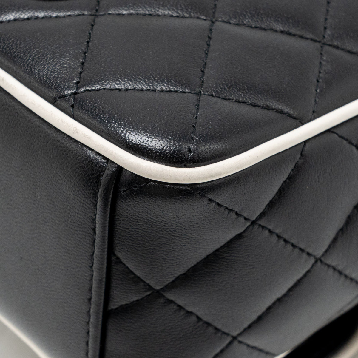 Chanel mini backpack/crossbody bag lambskin black/white LGHW (microchip)