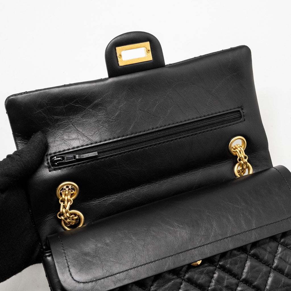 CHANEL SMALL 2.55 REISSUE DOUBLE FLAP BAG AGED CALFSKIN BLACK GHW (MICROCHIP)