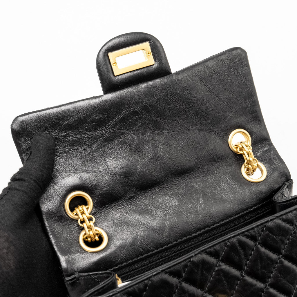 CHANEL MINI 2.55 REISSUE FLAP BAG AGED CALFSKIN BLACK BRUSHED GHW (MICROCHIP)